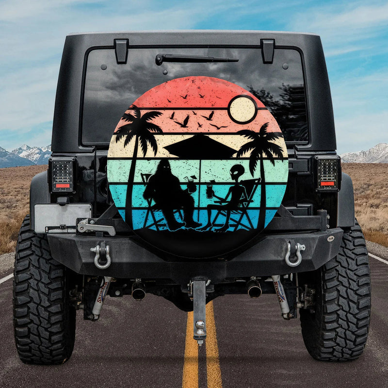 Load image into Gallery viewer, Bigfoot Sasquatch Alien Tropical Sunset Beach Spare Tire Cover
